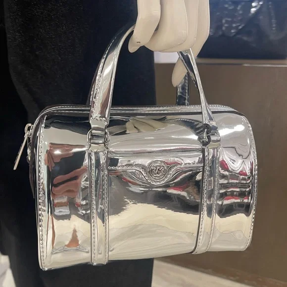 MICHAEL KORS Jet Set Small Patent Duffel Xbody Crossbody Bag
Silver 
NWT - Picture 6 of 16